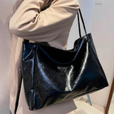 Paula | Glänzende Ledertasche