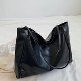 Paula | Glänzende Ledertasche