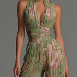Amelia – plissierter grüner Overall mit Blumenmuster
